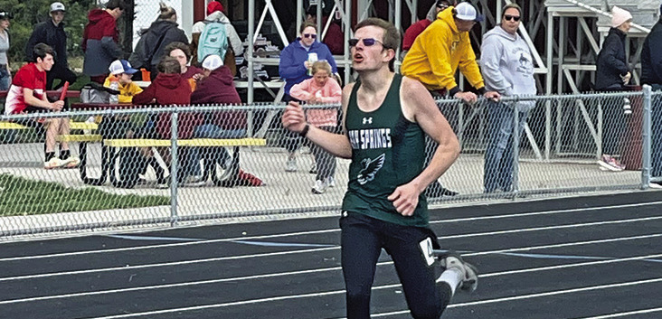 Photo by Jessica Mintken Hawks sophomore Mason Albrecht digs deep during his first place finish in the 800 meter race on Friday, May 3.