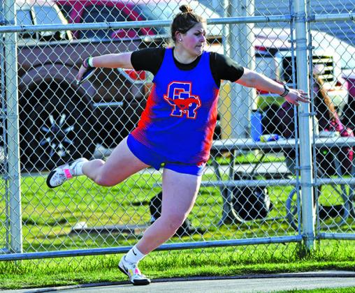 Photo by Melissa Grover Senior McKinley Grover spins her way to a new school record in the Discus at Best of the West. The Wayne State College signee’s throw of 145-8.5.00 puts her in first place all-time in the Mustang record books.