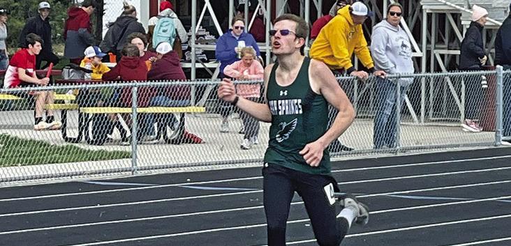 Photo by Jessica Mintken Hawks sophomore Mason Albrecht digs deep during his first place finish in the 800 meter race on Friday, May 3.
