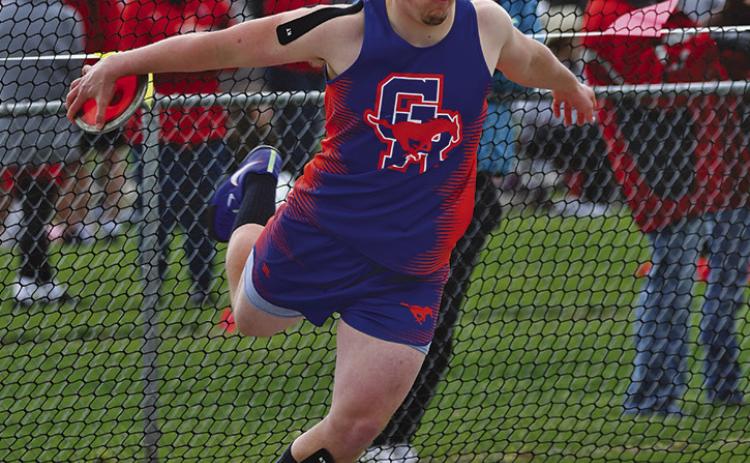 Photo by Melissa Grover Senior Colton Archibald spins prior to his Discus attempt. Archibald and the Mustangs will head to Bayard for the Class C-9 District Meet on Thursday, May 9.
