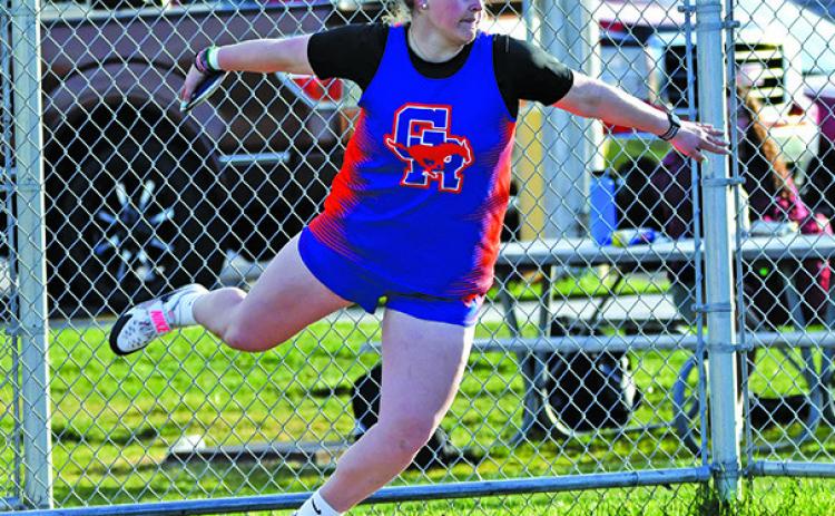 Photo by Melissa Grover Senior McKinley Grover spins her way to a new school record in the Discus at Best of the West. The Wayne State College signee’s throw of 145-8.5.00 puts her in first place all-time in the Mustang record books.
