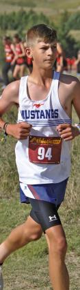 (Photo by Chris Heiser) Senior Jackson Roffers goes out strong at the Chadron Invite on Friday, September 11 for the Mustang XC team.