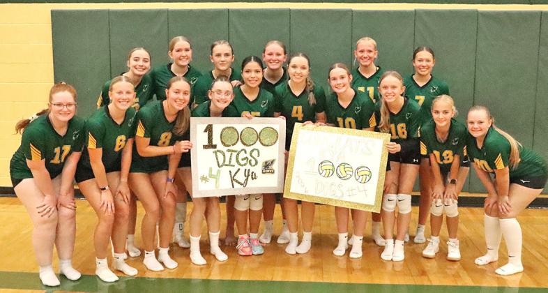 (Photo by Scott Bidroski) It’s all smiles for the Hawk Volleyball team following their win over Bayard and the reaching of the 1,000 dig milestone by senior Kya Binger. Binger collected 8 digs to surpass the monumental defensive statistic.