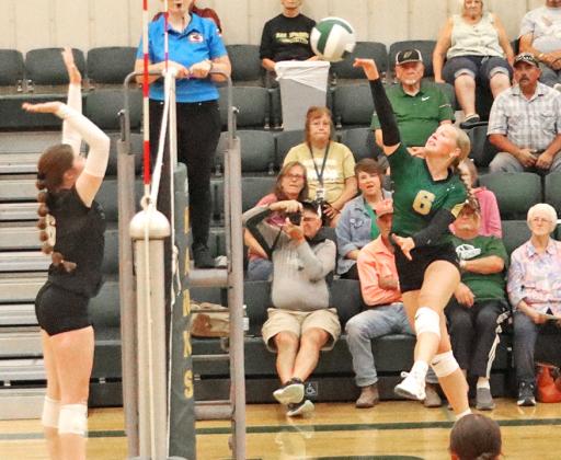 Photo by Scott Bidroski Senior Reese Varvel fires a shot against the Stuart Broncos on Thursday, Sept. 10. The Hawks would hold off the pesky Broncos with a five set win.