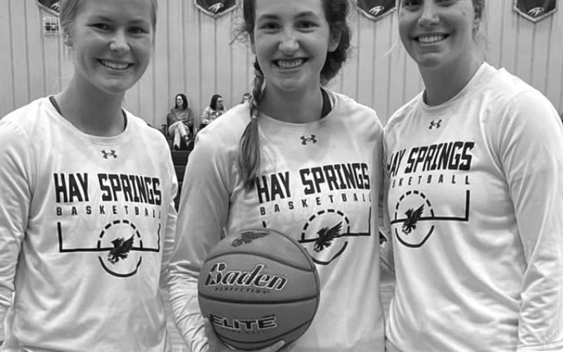 Courtesy Photo Hawks seniors Alexa Tonjes, Adriana Hafner, and Gabby Twarling put the finishing touches on outstanding careers on the basketball court this past week.