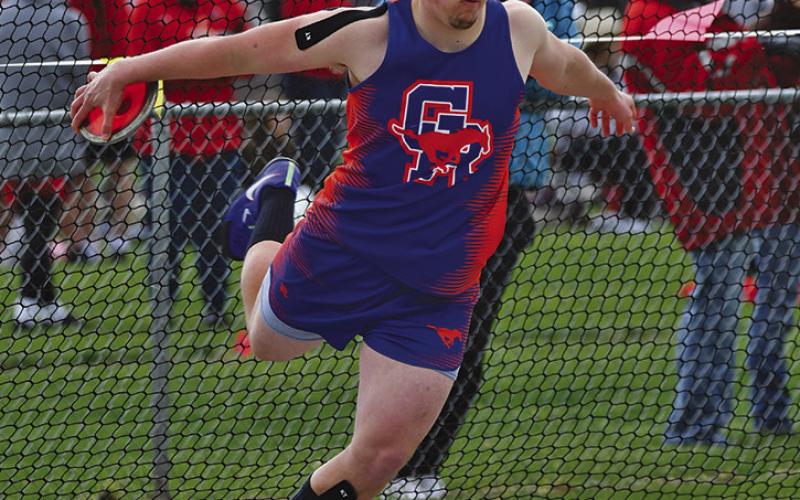 Photo by Melissa Grover Senior Colton Archibald spins prior to his Discus attempt. Archibald and the Mustangs will head to Bayard for the Class C-9 District Meet on Thursday, May 9.