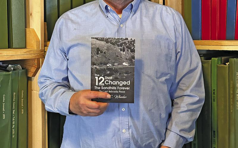 (Photo by Scott Bidroski) Gordon native Harlen Wheeler spent numerous years researching the tragic events of 1952 leading up to the killing of Blaine Ellis. In his new book, “The 12 Hours That Changed The Sandhills Forever,” Wheeler reveals an in-depth account of the man who carried out multiple murders, and the local posse that brought it all to an end.