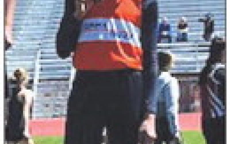 Courtesy Photo Braylon Holston holds up his bronze medal from the Discus event at Best of the West.