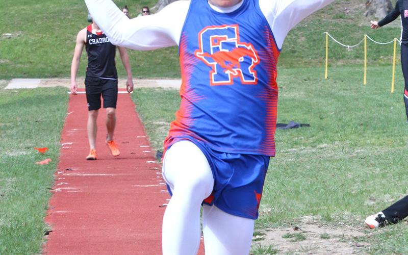 Photo by Con Marshall Sophomore Johnny Ziller set a season best in the Long Jump at the Chadron Twilight Track Meet. Ziller would leap to a distance of 18’ 8.5.