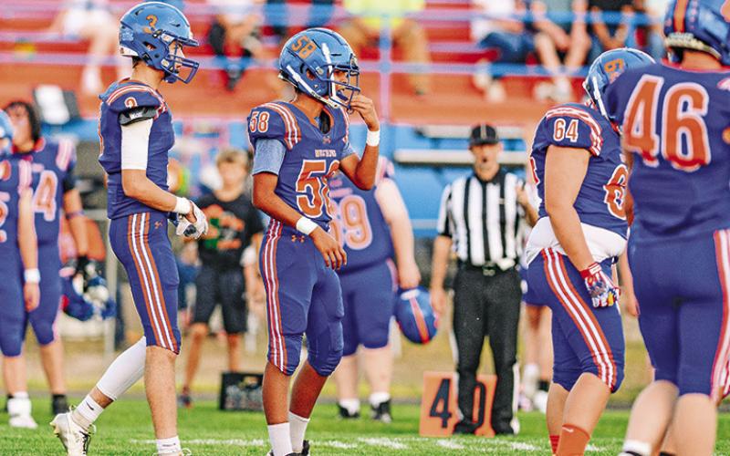 Photo by Morgan Meisenheimer The Gordon-Rushville defense lines up for a play earlier in the 2025 season. The Mustangs fell this week to Hershey but will look to bounce back on Friday against Valentine.