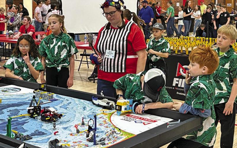 (Photo by Melissa Mracek) The Wild Robots from Rushville compete during the FIRST LEGO League Championships in Lincoln, Neb. on Saturday, March 22.
