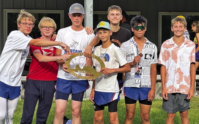 Photo by Amy Schmidt The Gordon-Rushville Boys Cross Country team took home the first place team trophy from Bridgeport on Tuesday, September 17.