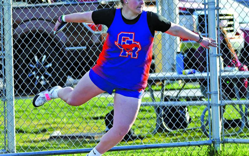 Photo by Melissa Grover Senior McKinley Grover spins her way to a new school record in the Discus at Best of the West. The Wayne State College signee’s throw of 145-8.5.00 puts her in first place all-time in the Mustang record books.