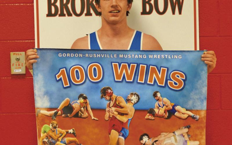 Photo by Michele Heck G-R senior Tucker Banister picked up win #100 during the Class C District Tournament. Banister completed his career as a Mustang on the mat at the District tourney.