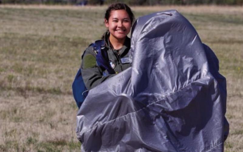 Courtesy Photo Alliah Bourne with a big smile after completing a solo jump from an airplane, one of the many experiences she’s had at the Air Force Academy in Colo.