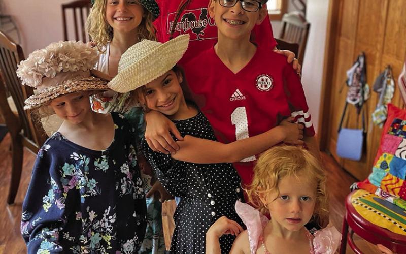 Courtesy Photo Sherry Retzlaff, pictured here with her grandchildren, has been selected for the Good Neighbor Award by the Sheridan County Ag Society.