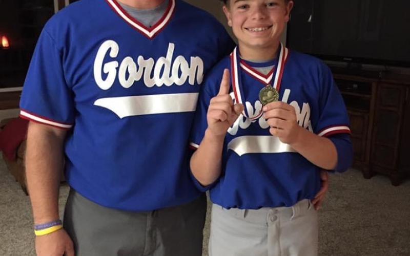 Logan Slama and dad Casey.