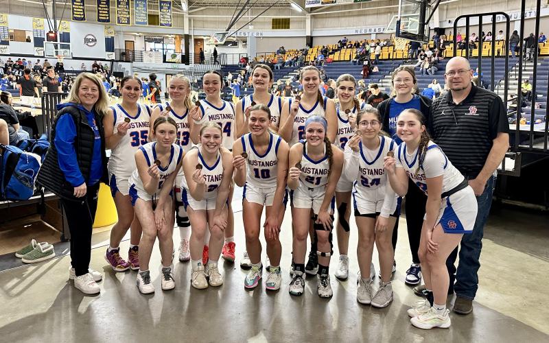 (Photo by Scott Bidroski) The Gordon-Rushville Girls Basketball team finished in third place at the Western Trails Conference Tournament on Saturday, February 8. The Mustangs downed the Morrill Lions by the final score of 46-30 for the bronze medal.