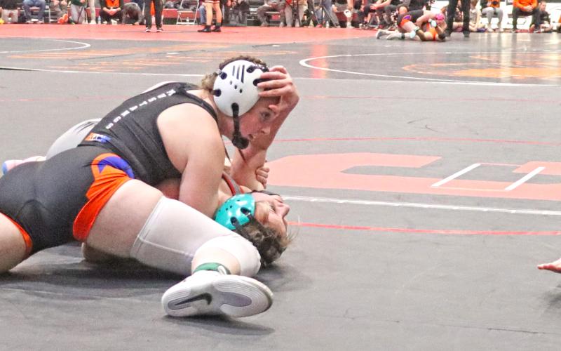 (Photo by Scott Bidroski) At the 3:12 mark in the second period, Kirsten Heck gets her opponent locked down to receive the fall from the official.