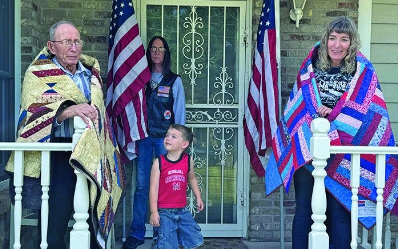 Courtesy Photo US Army Veteran Edward Raymond Zlomke (left) along with his daughter USAF Veteran Lori Zlomke Armstrong (right) received a Quilt of Valor on Sunday, June 16.