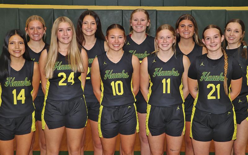 (Photo by Scott Bidroski) The 2025-26 Hay Springs Hawks Girls Basketball Team. Front row: (L-R) Katara Yellow Thunder, Olivia Dahlgren, Alaina Raymer, Reese Varvel, and Tailyn Starke. Back row: (L-R) Emily Forney, Mya Turman, Devyn Young, Julia Russell, and Kya Binger.