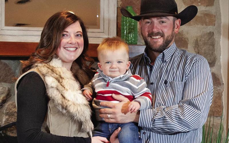 Courtesy Photo Emilee Wells, the new counselor for Hay Springs Public Schools, is pictured here with her husband Wade and their son Buck.