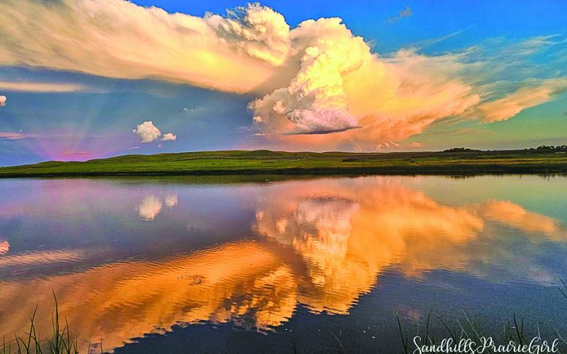 (Photo by Nicole Louden, Sandhills Prairie Girl) The views from the Sandhills of Nebraska are priceless. Ellsworth resident Nicole Louden shares those amazing glimpses through her social media page, Sandhills Prairie Girl.