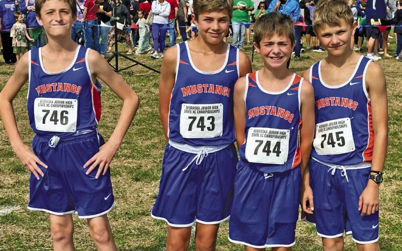 (Photo by Scott Bidroski) The 2025 Gordon-Rushville Middle Schools Boys Cross Country team prepares at the Start Line for the 2025 Nebraska Middle School Championships in Papillion, Neb. on Saturday, October 11. The group includes (L-R) Logan Leonard, Nixon Banks, Braxton Bidroski, and Cordell Dehning.