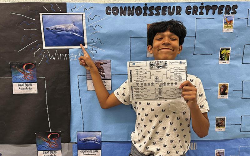 Photo by Amy Schmidt Joel Montenez-Rodriguez shows off his winning bracket for March Mammal Madness at Gordon-Rushville Middle School.