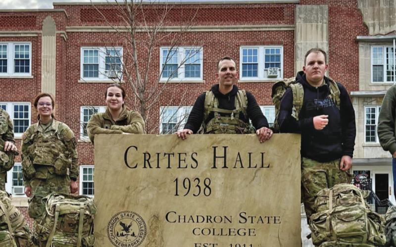 (Courtesy Photo) Kylie Coomes, third from left, with other members of the War Eagles, pose on Chadron State College’s campus.