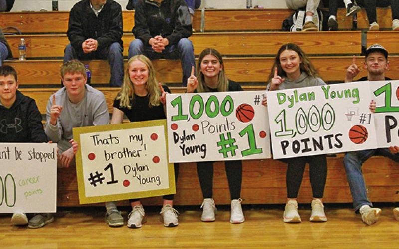 (Photo by Bev Lee) The fan section for Hawks senior Dylan Young was strong when he surpassed the 1,000 point mark on Saturday, January 25.
