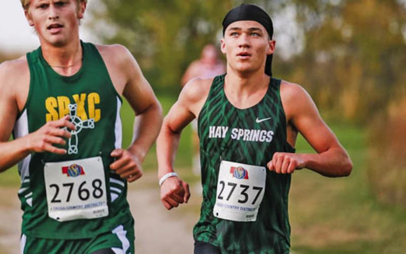 (Photo by Cassie Banks) Senior Parker Wellnitz cruises during the Class D-6 District race on Thursday, October 16. The senior made it four in a row, finishing in sixth place to qualify for State XC in Kearney on October 24.