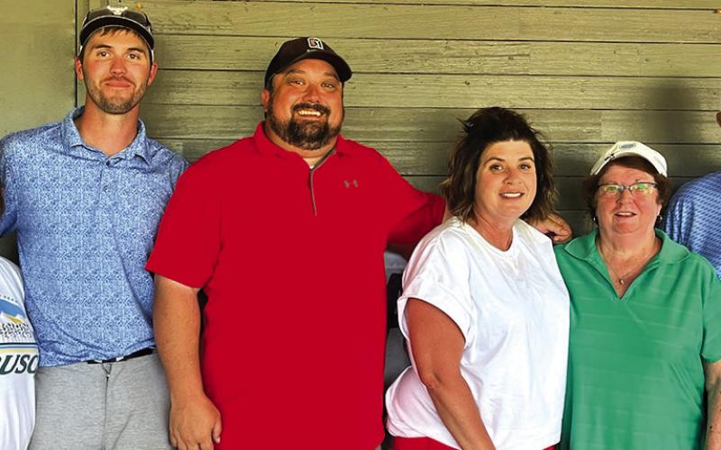 Courtesy Photo CARE Tournament Couple’s Division winners (L-R) Jacoby Anderson, Kyle Anderson, Brad Gates, Brooke Gates, Marilyn Borders, and Rod Borders.