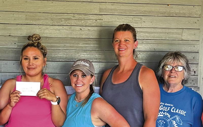Courtesy Photo CARE Tournament Women’s Division winners (L-R) Faith Cross, Brittany Has No Horse, Jill Alcorn, Sterling Leeper, Joyce Benben, and Marie Tystad.
