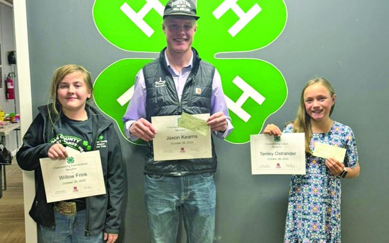 Courtesy Photo Outstanding Members of the Year were chosen at the 4-H Achievement Banquet. Willow Frink, Jaxon Kearns, and Tenley Ostrander were recognized in their respective age groups for their hard work.