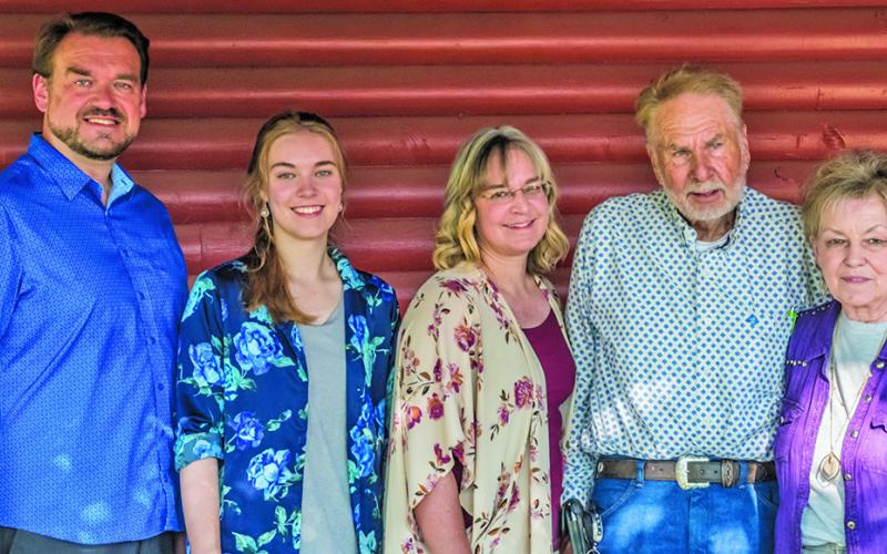 Photo by Tim Liebermann Tom and Karen Cobb (both far right) were honored at the annual Tri-State Oldtime Cowboys Hall of Fame breakfast as the newest members of the prestigious club. They were joined by the Hurd family, with daughter Laura Hurd (center) delivering the invocation for her parents.