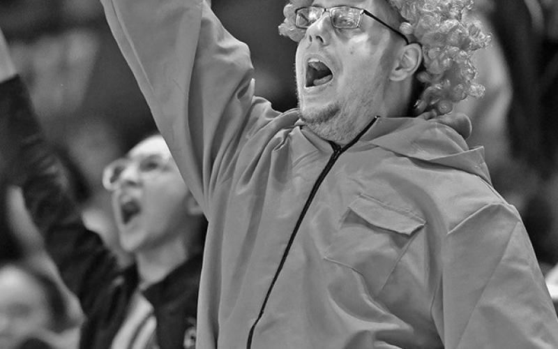Photo by Eric Gregory for the Flatwater Free Press Kevin Coleman cheers on the Husker women gymnastics team as they host Michigan at the Devaney Sports Center on Jan. 27, 2024.