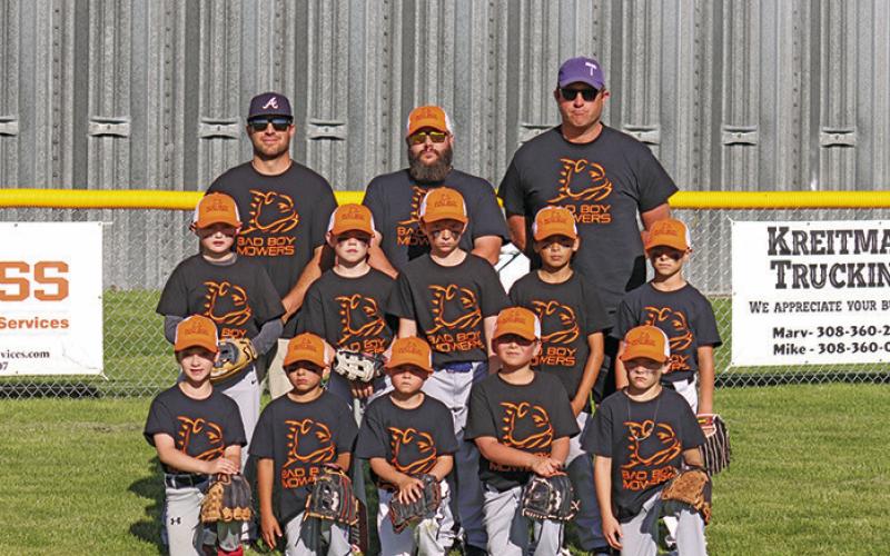Courtesy Photo 2024 Bad Boy Mowers Rushville Rookies Baseball. Front Row: (L-R) Cameron Heck, Bryce Big Crow, Albert Conn, Wade Vocu, Landon McConaughy. Second Row: (L-R) Jace Leonard, Christian Viher, Franklin Dolezal, Piercen Has No Horse, Jhett Janssen. Back Row: (L-R) Coaches George Viher, Jared Janssen, Matt Dolezal.
