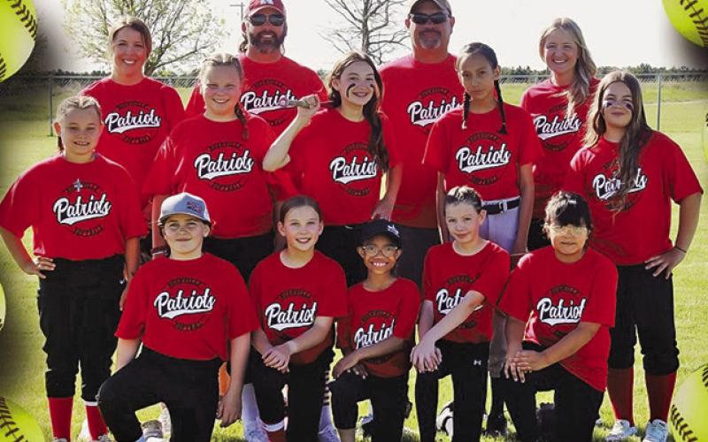 Courtesy Photo 2024 Rushville Freshman Patriots Softball. Front Row: (LR) Willow Frink, Cleo Swanson, Arya Bracken, Brooklyn Leonard, and Tiana Hernandez. Second Row: (L-R) Lena Conn, Ellerie Davis, Ezra Bourne, Elise Has No Horse, and Aybrie Younkin. Back Row: (LR) Coaches Bailey Swanson, Loran Swanson, Mike Bourne, and Kristian Bourne.