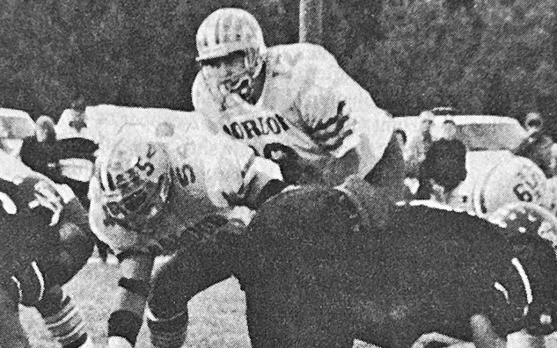 (Photo from the Gordon Journal Archives) Shannon Moore, under center, awaits the snap during a game his senior year at Gordon High School in 1995. Moore has continued his career in football, logging 21 years of college coaching experience.