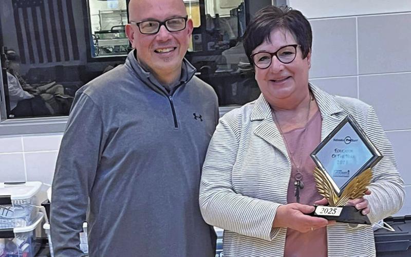 (Courtesy Photo) Gordon-Rushville ProStart educator Kay Kruger (right) stands with the Executive Director Nebraska Hospitality Association Craig Casados (left) after receiving the 2025 Nebraska ProStart Educator of the Year award.