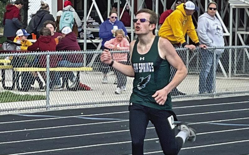 Photo by Jessica Mintken Hawks sophomore Mason Albrecht digs deep during his first place finish in the 800 meter race on Friday, May 3.