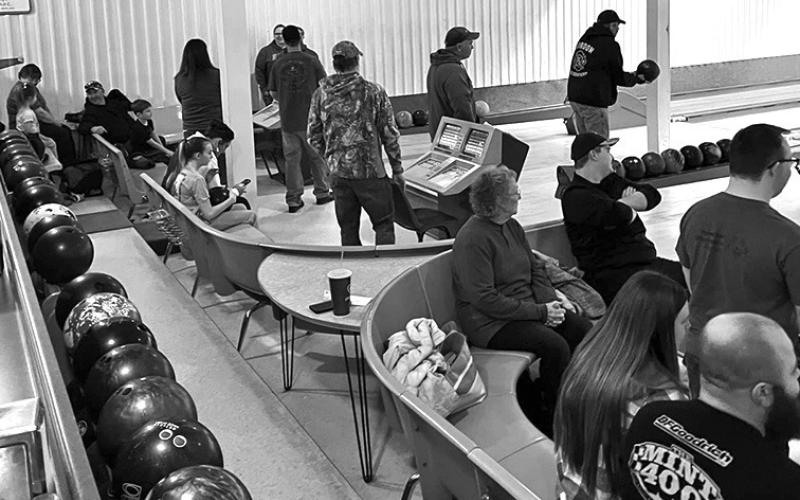 Courtesy Photo Community members come together to support the CARE Bowling Fundraiser.