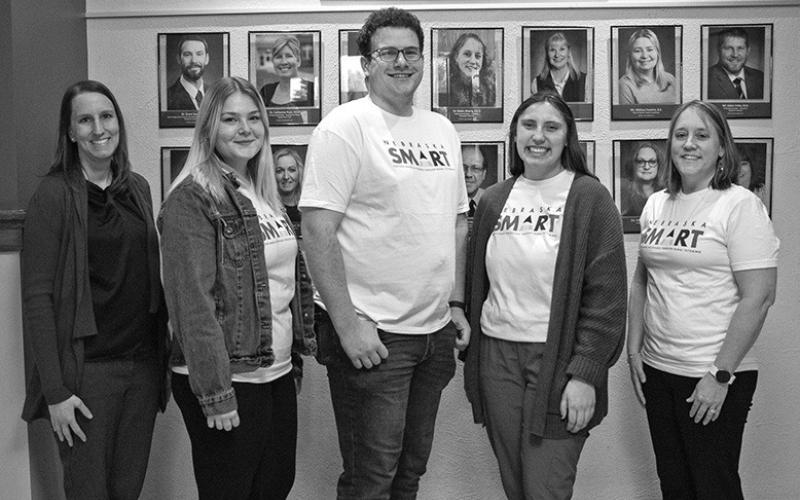 Photo by Tena L. Cook, CSC Julie Dickerson, Success Made Accessible through Rural Tutoring (SMART) Director with the Nebraska State College System (NSCS), left, poses Jan. 23, 2024, in Old Admin with CSC teacher education candidates and SMART tutors Kayleigh Reinscah of Casper, Wyo., Scott O’Dell of Gillette, Wyo., and Emma Johnson of Rapid City, S.D., with Associate Professor of Education Dr. Robin Brierley, CSC’s SMART coordinator.