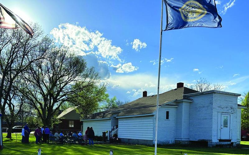 Photo by Heidi Beguin A crowd begins to gather at the Rushville Armstrong House Museum on May 17 for a ground breaking ceremony. After a long road of fundraising, the History Center addition has begun.