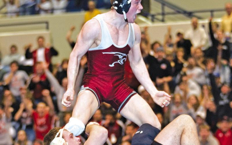 Courtesy Photo Then a senior at Chadron State College, Rushville native Brett Hunter had reason to celebrate when this photo was taken. He had just won his second NCAA Division II National Wrestling Tournament championship by edging Marty Usman of Nebraska-Kearney 3-2 for the 174-pound title. Hunter finished his college career with a 133-32 record.