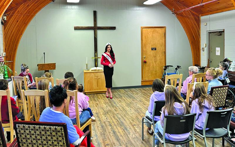 (Photo by Scott Bidroski) Miss USA Audrey Eckert visited Gordon Countryside Care on Friday, December 26. Eckert signed autographs, detailed her recent busy life with her crown, and answered questions from the 50 plus people who attended the event.