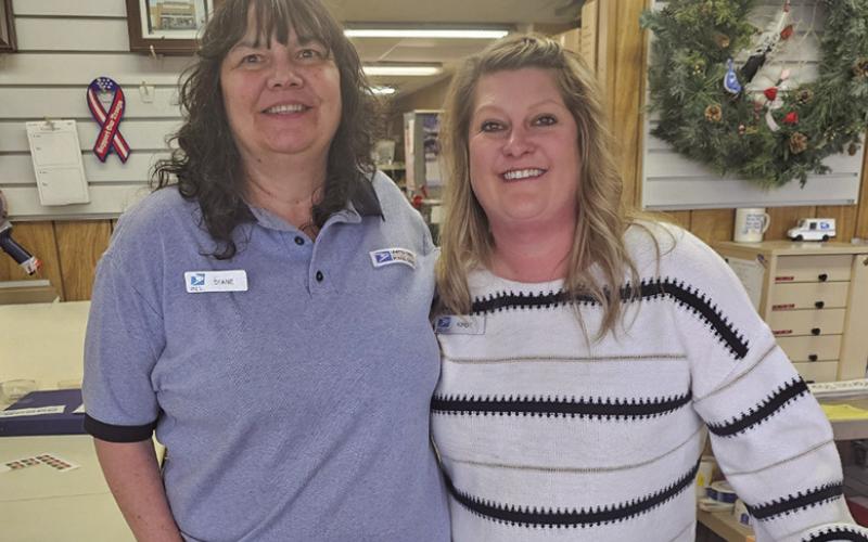 (Photo by Chris Heiser) Diane Grimm (left) and Kirby Roffers (right) have recently moved into the Postmaster roles in Rushville and Gordon. Grimm has taken over the leadership role in Rushville while you will find Roffers at the Gordon Post Office.