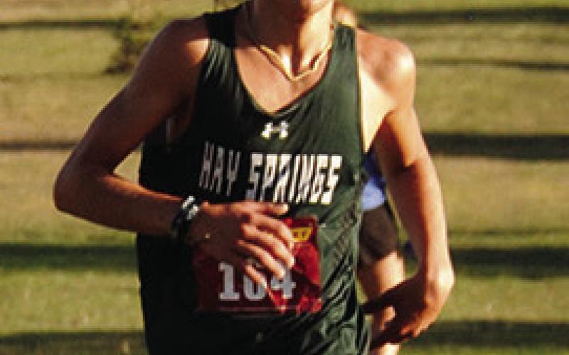 Photo by Chris Heiser Parker Wellnitz qualified for State XC on October 17.