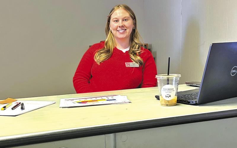 Courtesy Photo Caitlin Roes, pictured in her Rushville office, has been named the new Rural Prosperity Educator for the Nebraska Extension. Roes will spend time in Sheridan County along with multiple other counties across the Panhandle in her role.